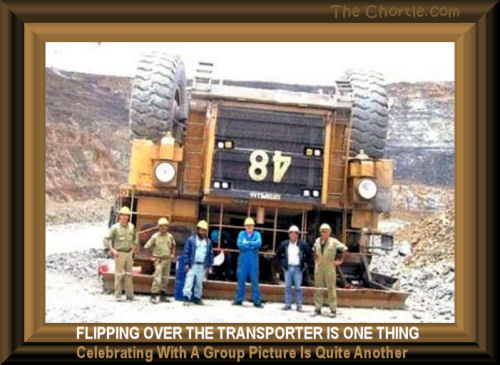 Flipping over the transporter is one thing.&nbsp;Celebrating with a group picture is quite another.